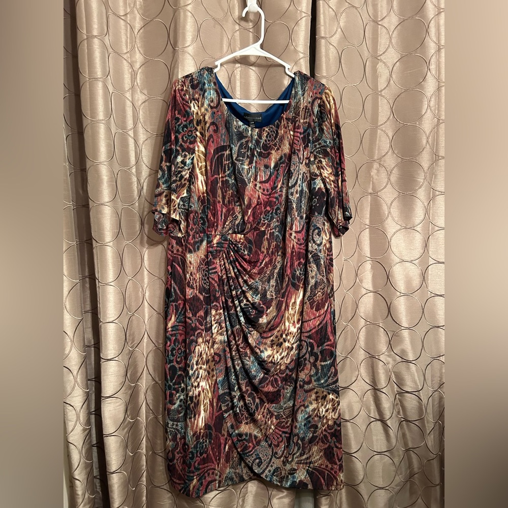 Connected Apparel, never been worn, multicolored, asymmetrical dress.